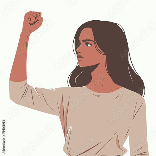 Young woman raising fist