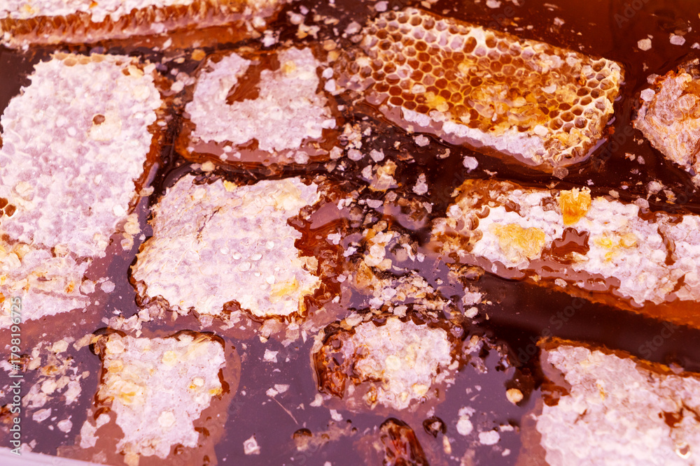 Fototapeta premium close up of honey, honey background, sweet honey, texture.