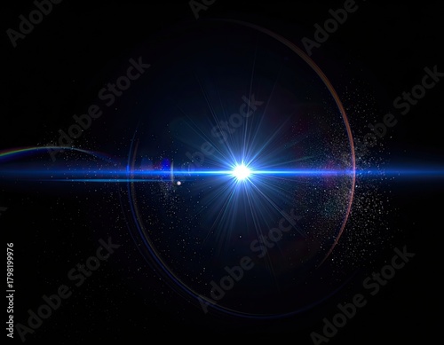 Bright blue starburst with lens flare, circular halo, and particles on black