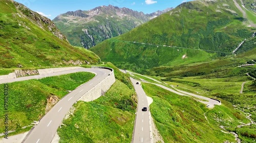 Aerial drone view of scenic road Susten Pass mountain pass in Swiss Alps in summer. Switzerland 4k.