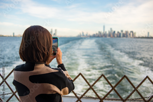 Ferry passenger facing Manhattan