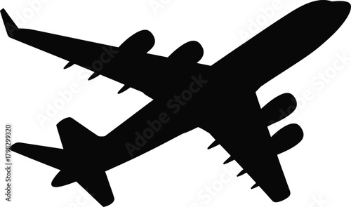 Black silhouette of an airplane in flight