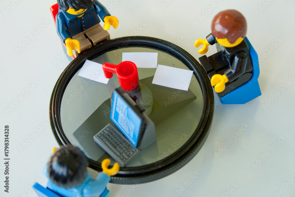 Obraz premium Lego Minifigure Team Meeting for Business Strategy