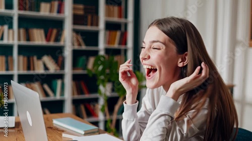 Cheerful Student Engaged in Online Learning and Creative Writing