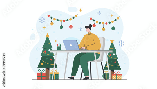 Remote worker busy on a laptop in a festive Christmas office setting