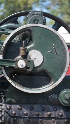Green Steam Engine wheel detail with rivetted steel