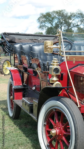 Red Antique Fire Truck on with 3 rows of seating