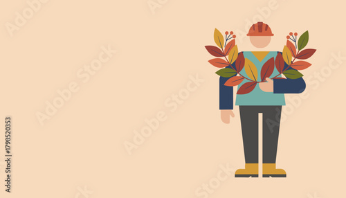 Worker in hard hat holds autumn leaves Labor harvest sustainability and green industry concept