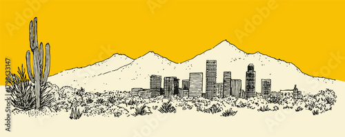 A city skyline with mountains in the background. The city is on the right side of the mountains