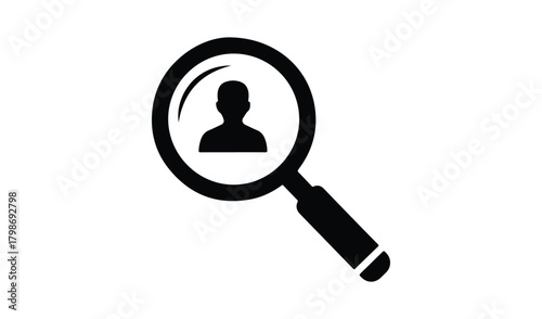 Magnifying glass focused on a silhouette of a person