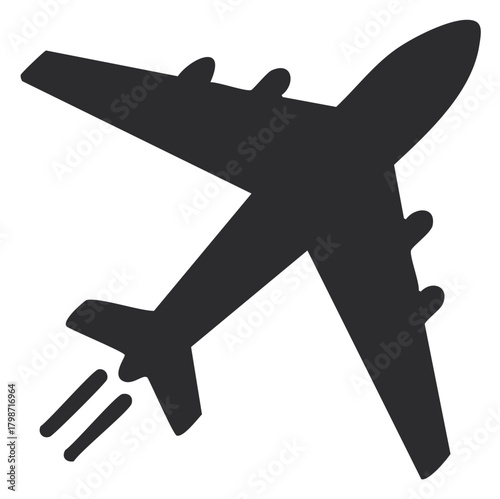 Dark silhouette of a modern jet airplane in flight with contrails