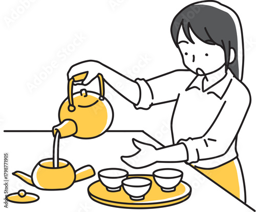 急須でお茶を用意する女性