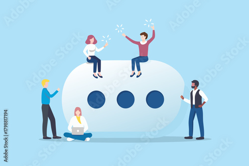Diverse group of people interacting around a large speech bubble symbolizing communication and collaboration