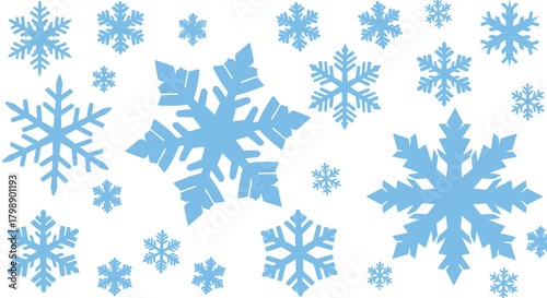 Scattered blue snowflakes of varying sizes on a white backdrop, concept for winter decorations, holiday backgrounds and festive elements