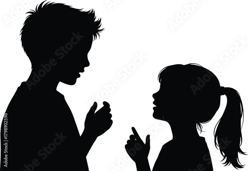 “Silhouette of two children communicating face to face with expressive hand gestures isolated on white background in conversation”