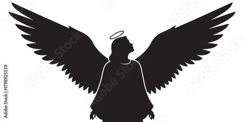 Angel silhouette spreading wings with halo above head