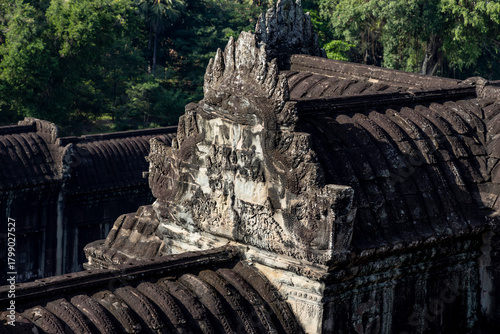 Fotografie Angkor wat ornate pediment with naga carvings crowning a tiled gallery roof in s
