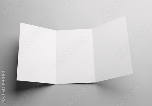 Blank A4 photorealistic brochure mockup on light grey background 