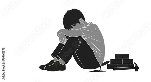 A sad boy sits next to building tools and bricks, depicting child labor or a difficult childhood.