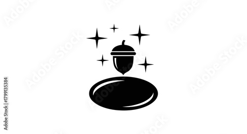 A black and white illustration of an acorn resting on an oval shape with stars and sparkles above it.