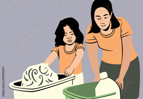 Mother Teaching Daughter Laundry Skills