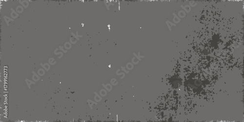 Grungy distressed grey background with textured speckles and rough edges for a vintage feel