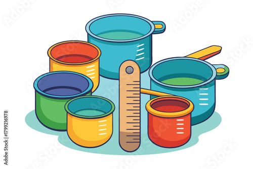 Assorted measuring cups and a brown ruler are placed on a soft blue surface