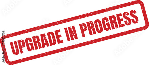 Red grunge rubber stamp mark with bold text message indicating an ongoing system enhancement process
