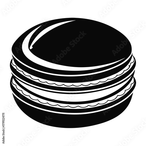 Monochrome circular confection showcases layered design and texture, a delightful culinary treat