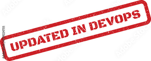 Red rectangular distressed rubber stamp indicating important updates within the fast evolving DevOps environment