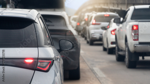 Wallpaper Mural Rear side of grey car driving on the concrete road. Traffic congestion. Cars queue and long line ahead. Different level bridge on the side. Torontodigital.ca