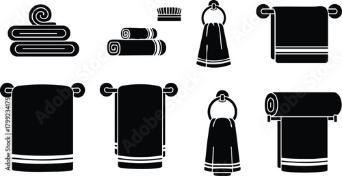 Bathroom towel vector set with towels on rack and rolled towels in black silhouette style 
