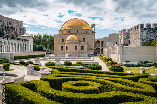View on the white gazebo, the main fortress, the gallery and the mosque golden cupola of Akhaltsikhe castle's garden (also calle Rabati) in Georgia