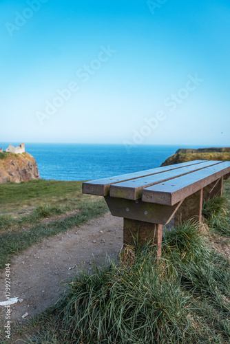 Empty wooden bench overlooking the North Sea