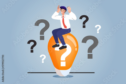 This problem solving concept shows a thinking man sitting on a lightbulb. He is surrounded by question marks, looking for an answer, a new idea, or a strategy to overcome business uncertainty.