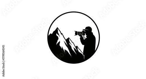 A silhouette logo of a photographer with a camera in front of a mountain range.