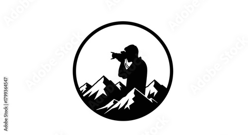 Silhouette of a photographer taking a picture in a mountainous landscape, enclosed in a circle.