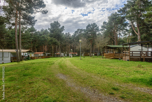 Wallpaper Mural Camping area with forest, cabins and trailers in Palencia, Spain Torontodigital.ca