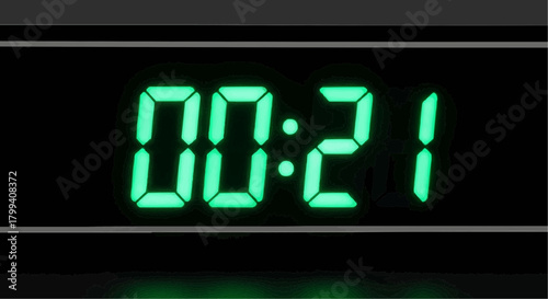 A close up of a digital clock displaying the time as zero hours and twenty one minutes exactly