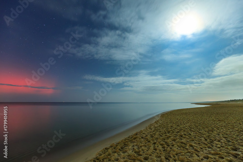 Fototapeta Naklejka Na Ścianę i Meble -  Aurora over the Baltic Sea beach by the Sobieszewo Island, Gdansk. Poland.