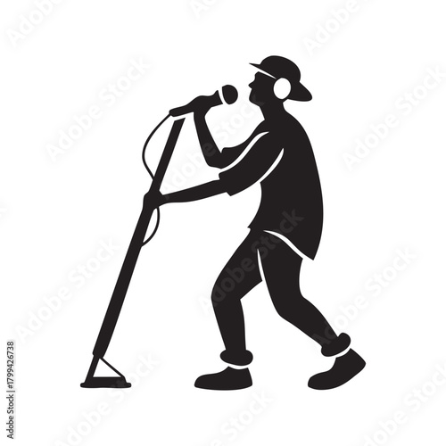 Silhouette of a rapper or singer performing live with a microphone and headphones