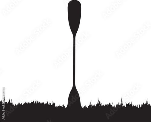 Black silhouette of canoe paddle in grass kayak water sport