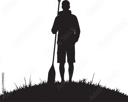 Black silhouette of man with paddle on grassy hill