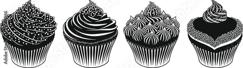 Four black and white stylized cupcakes with decorative frosting and sprinkles dessert