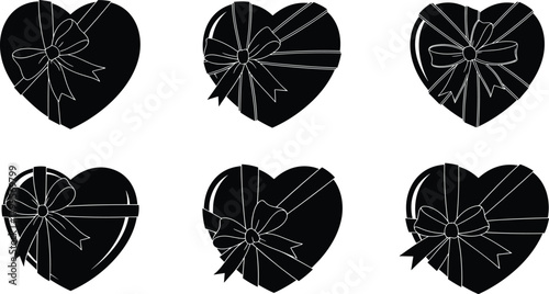 Six black heart shaped gift boxes with white ribbon bows heart gift box present