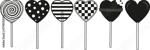 Six heart shaped lollipops with black and white patterns on sticks candy sweet
