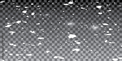 Transparent background with small falling snowflakes.