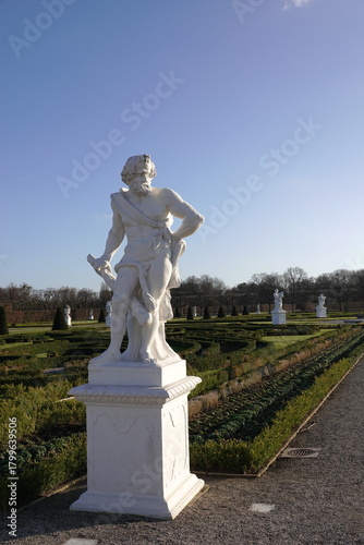 greek stone statue in park