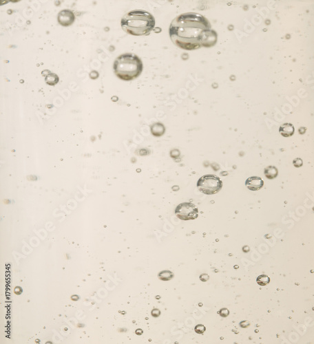 shampoo, cleanser, macro texture of oil with bubbles, cosmetic textures, skincare product liquid