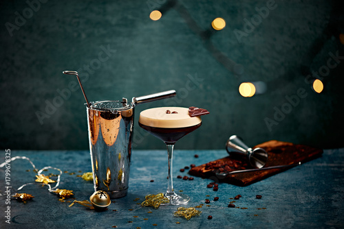 Espresso Martini with Chocolate Garnish and Cocktail Shaker on Festive Table